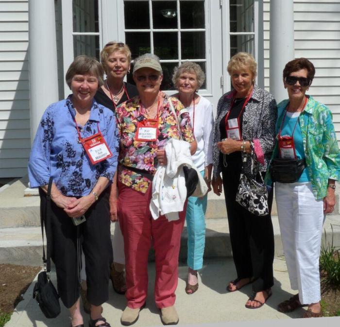 Class of 1960 friends in front of the Alpha Phi house